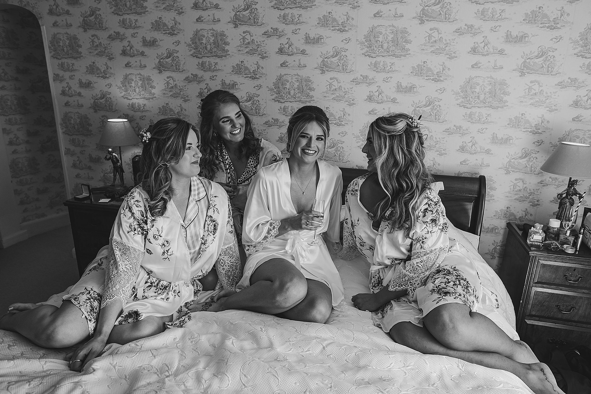 Bride and bridesmaids on morning of wedding